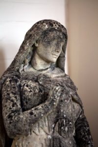 One of two statues by Harry Hems that he gave to the church.